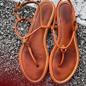 Tory Burch well worn flip flops brown